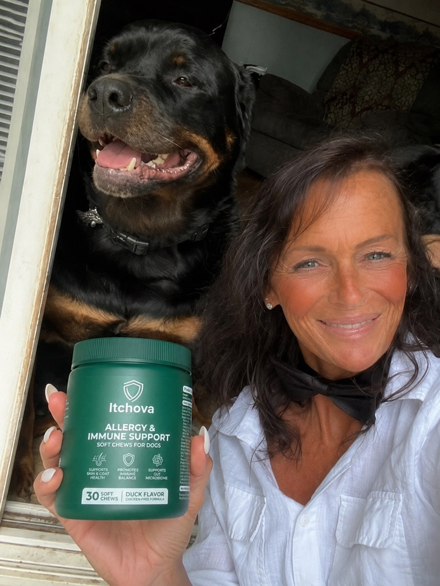 Dog parent at a doorway with her dog and an Itchova jar